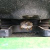 Wasp nest under a lawnmower seat