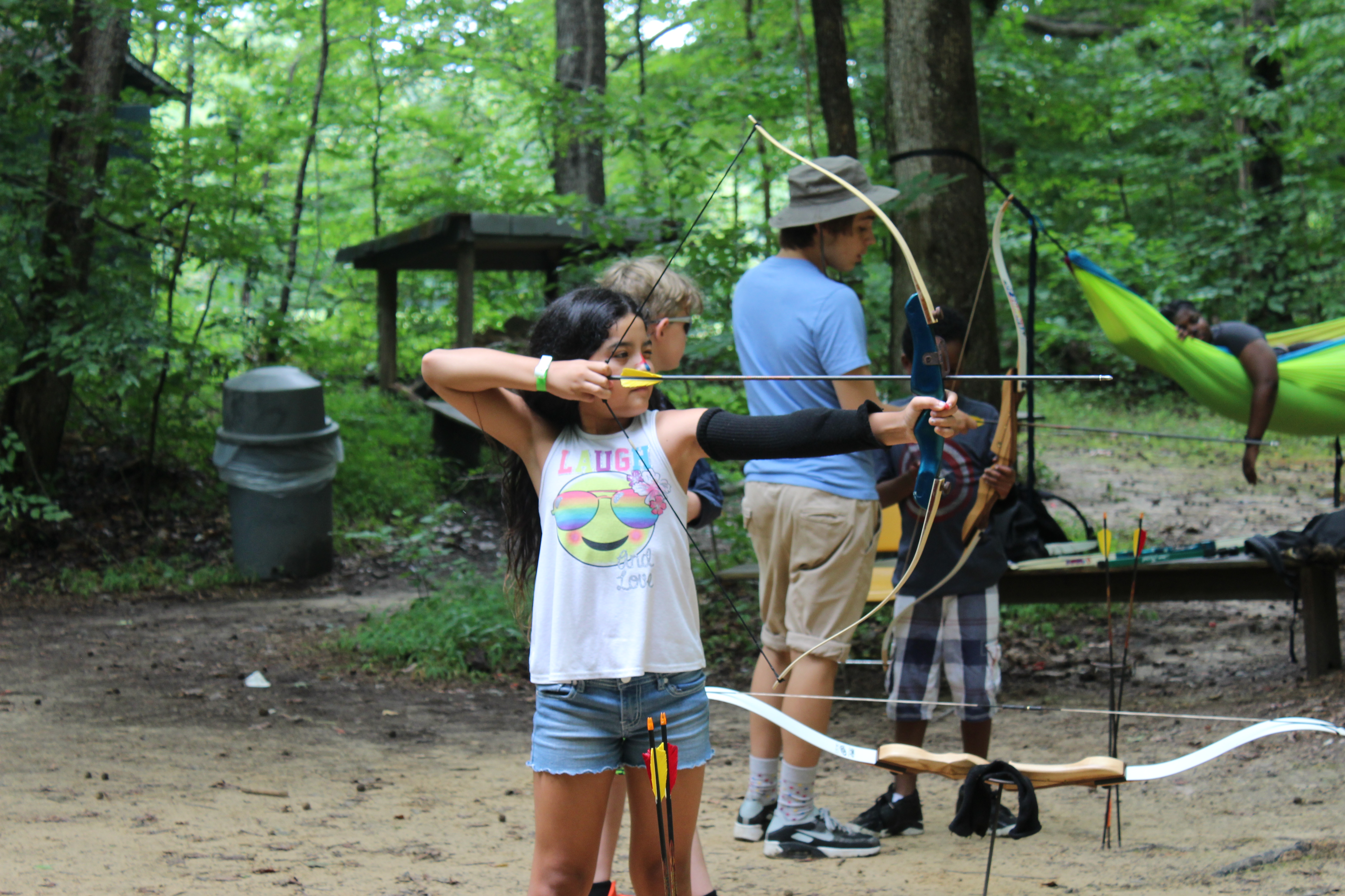 child practicing archery